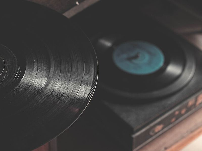 A vinyl record on a turntable, seen up close