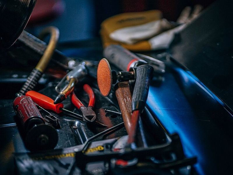 A drawer full of pliers, screwdrivers and other hand tools
