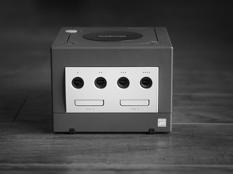 A Nintendo GameCube console, in black and white